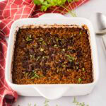 Stick a butter rice in a white casserole dish.