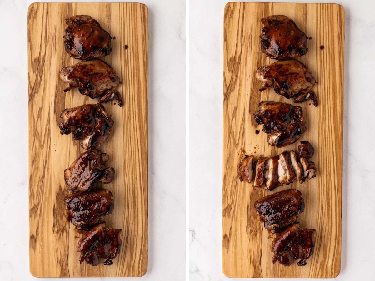 Teriyaki chicken on a wooden cutting board with some pieces hole and some sliced.