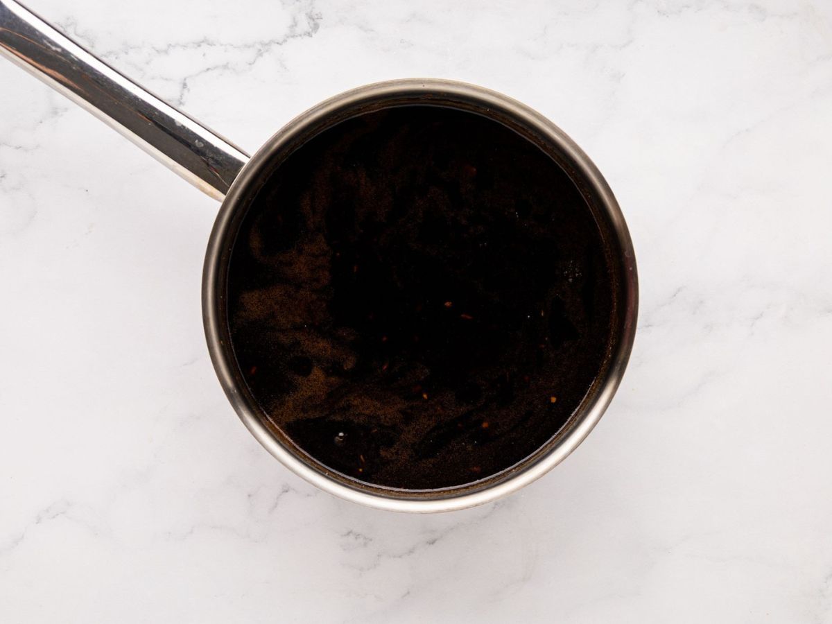 The teriyaki sauce in the saucepan.
