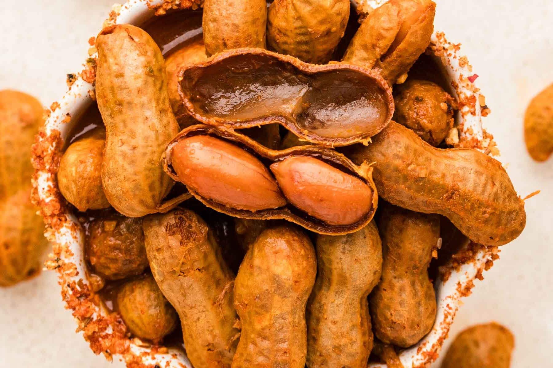 A boiled peanut opened to show the inside soft bean like texture.