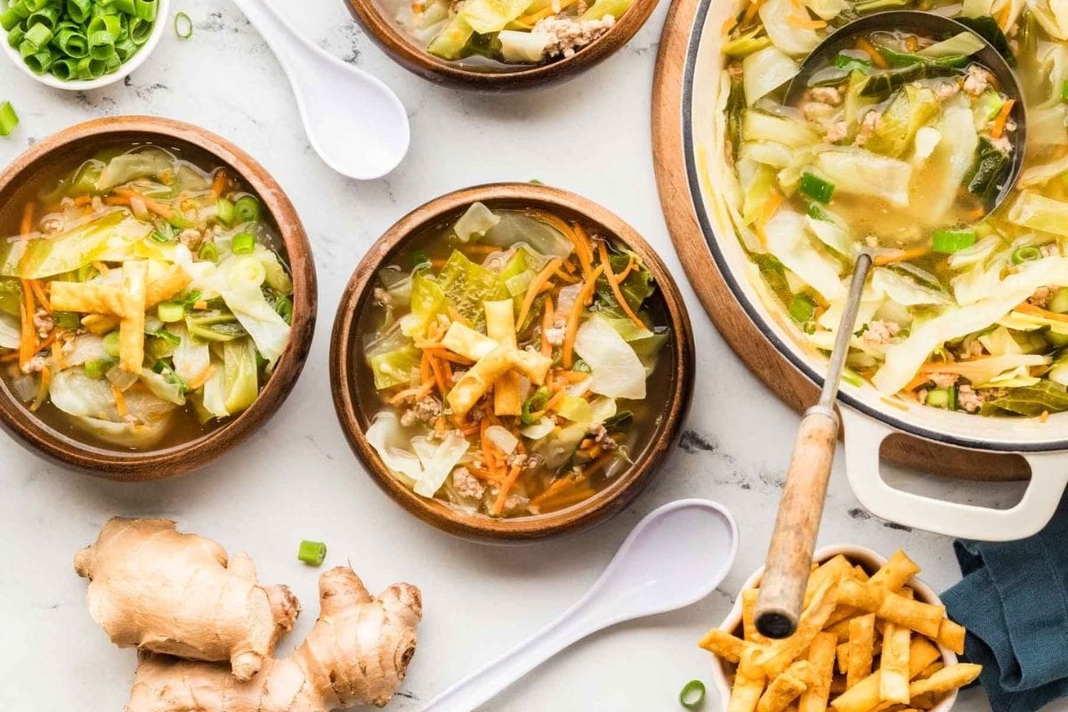 Egg roll soup served in two bowls.