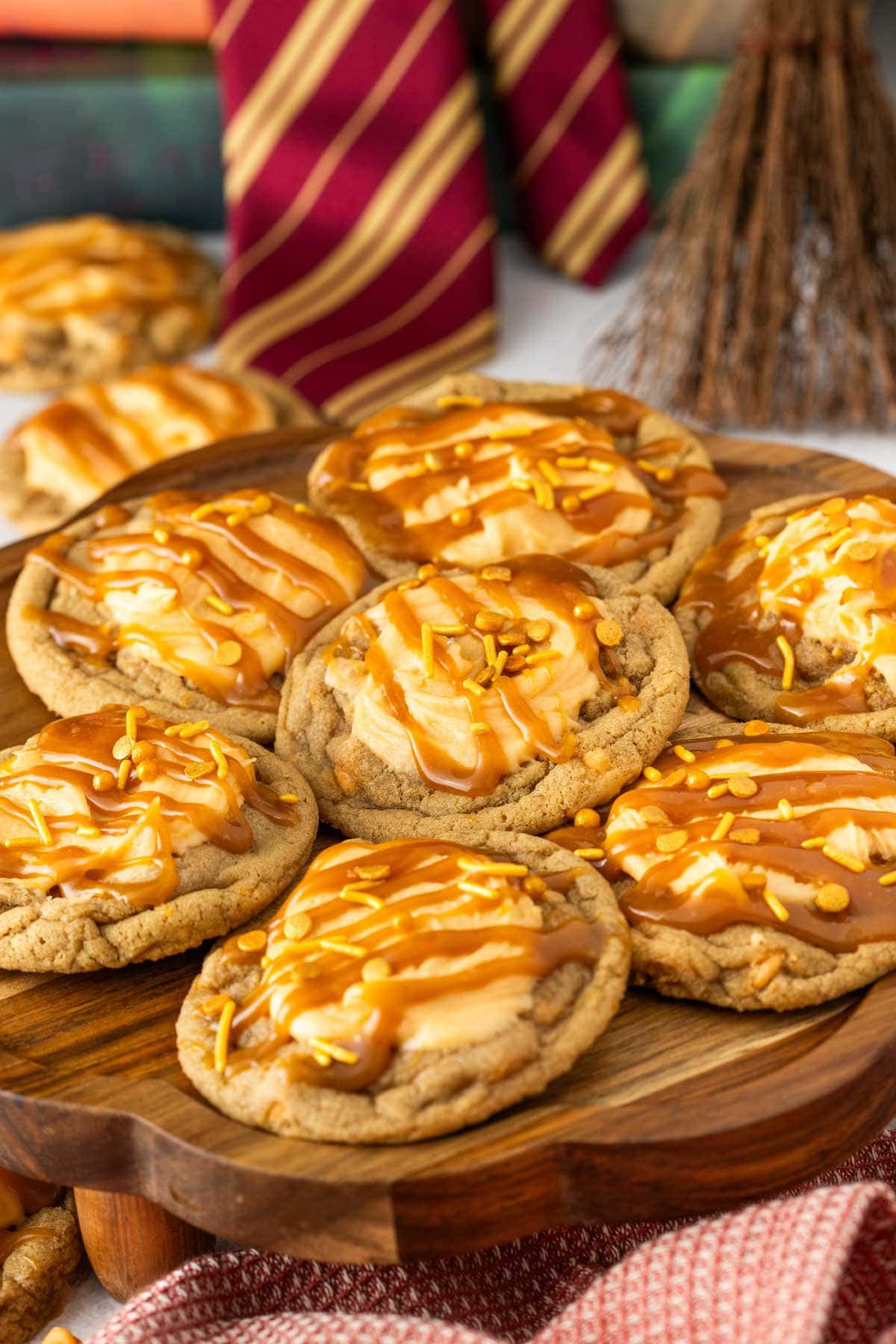 Harry Potter butterbeer cookies placed on a wooden serving platter.