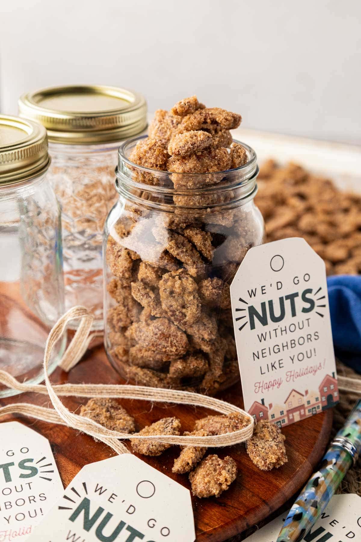 Praline pecans and a mason jar with a weed go nuts without you printable gift tag.