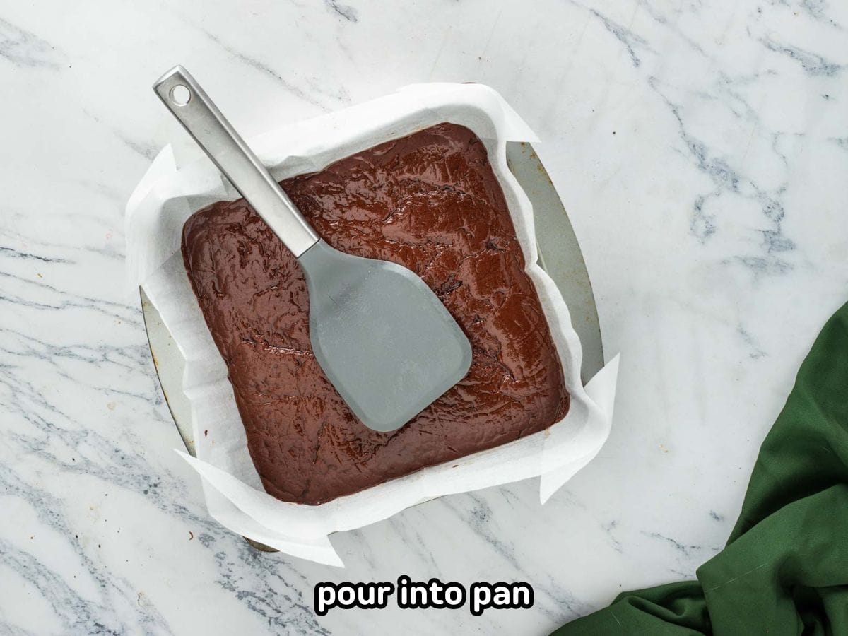 Fudge mixture poured into the prepared pan.