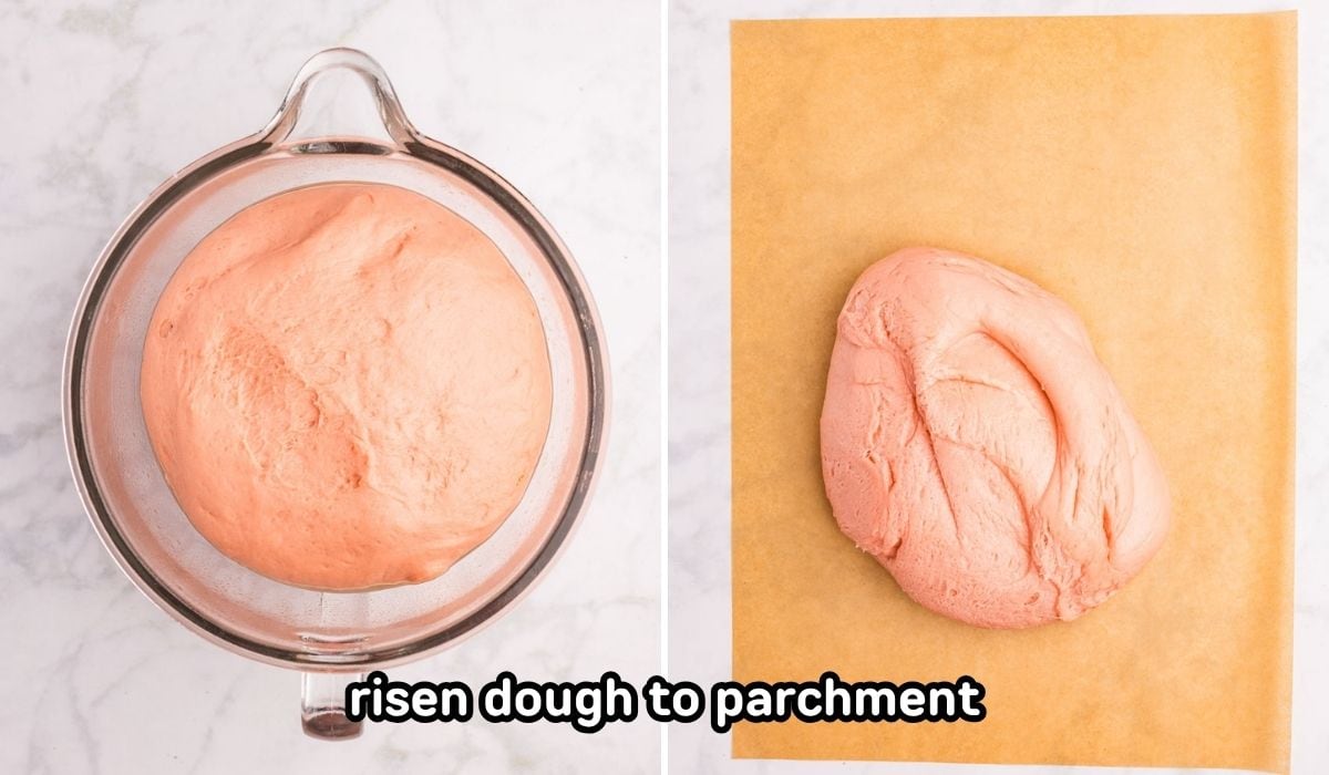 Risen strawberry yeast dough turned out onto parchment paper.