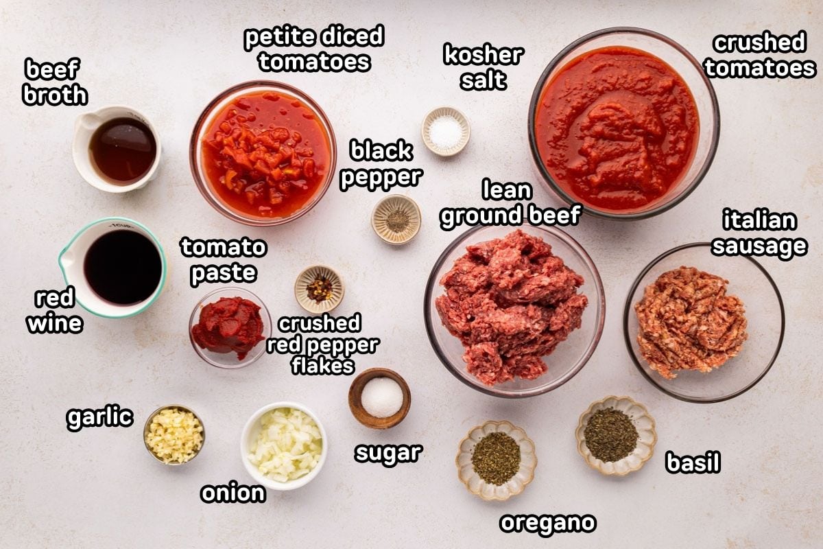 Labeled ingredients needed to make homemade meat sauce.