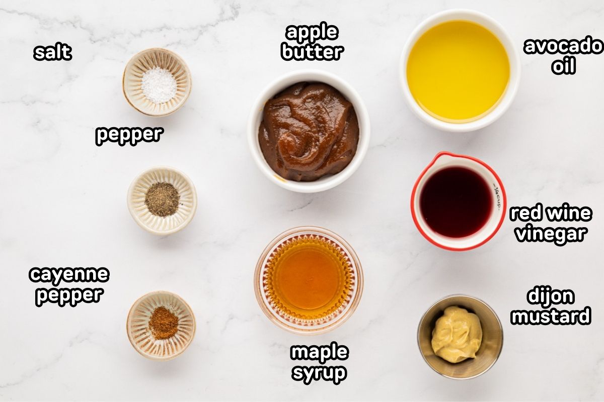A labeled image of ingredients needed to make apple butter vinaigrette dressing.