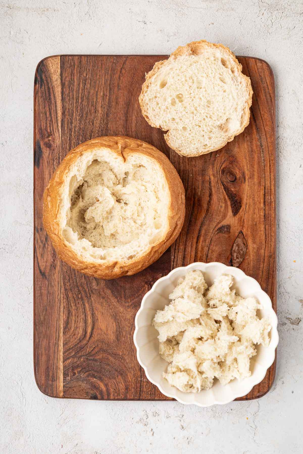 Bread cubes pulled from the middle of the loaf to hollow out bread bowl.