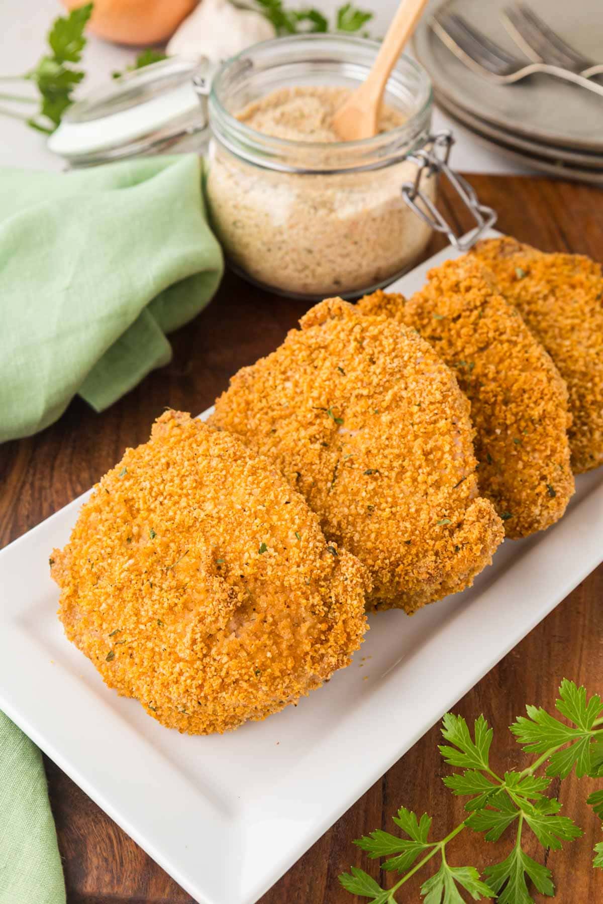 Shake and Bake Pork Chops on a white serving platter.