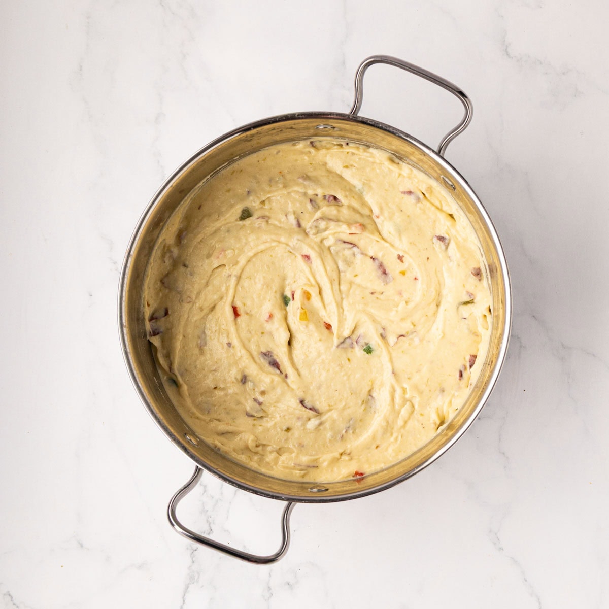 Papas con chile after cheese melted and stirred to combine.