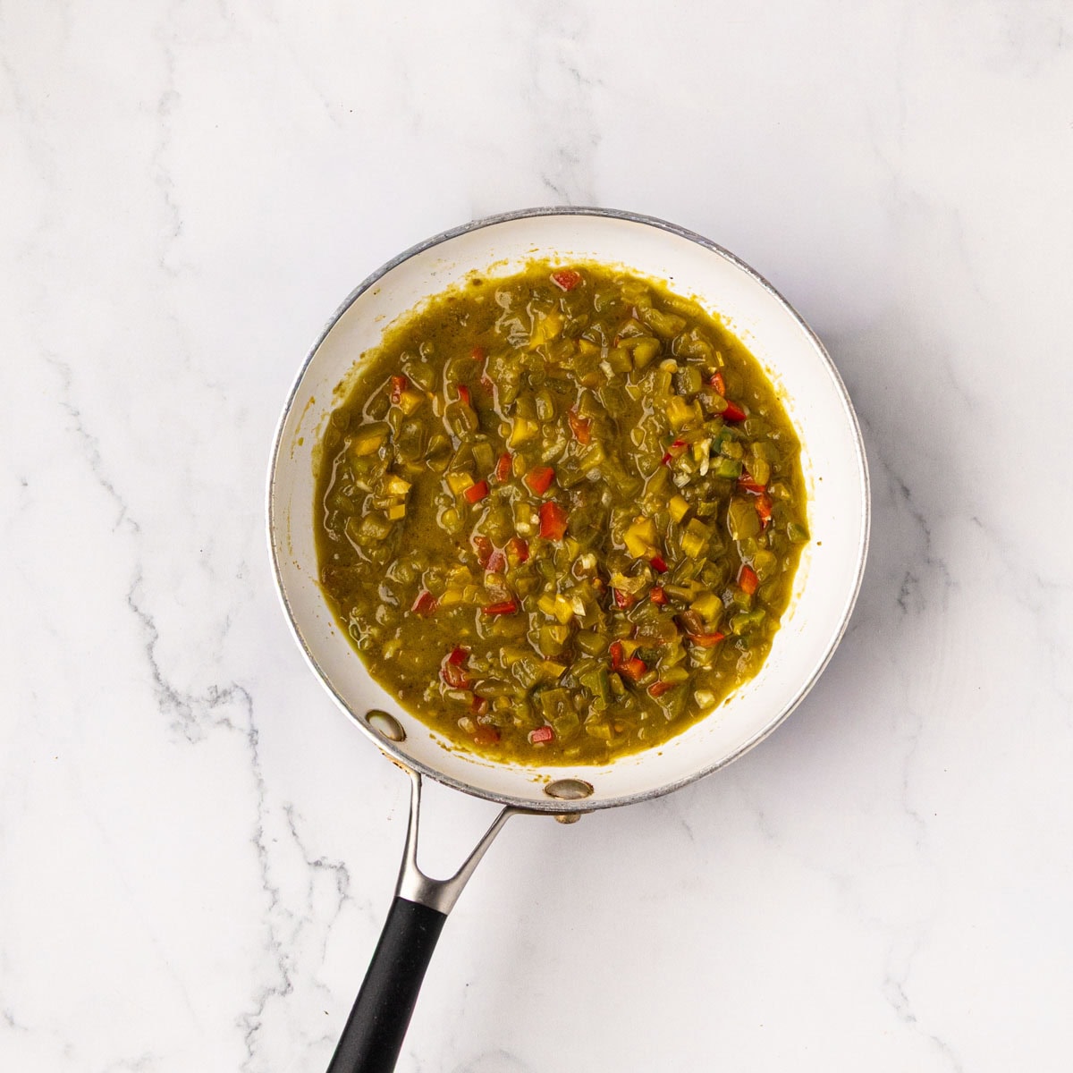Saut&eacute;ed veggies and a skillet.