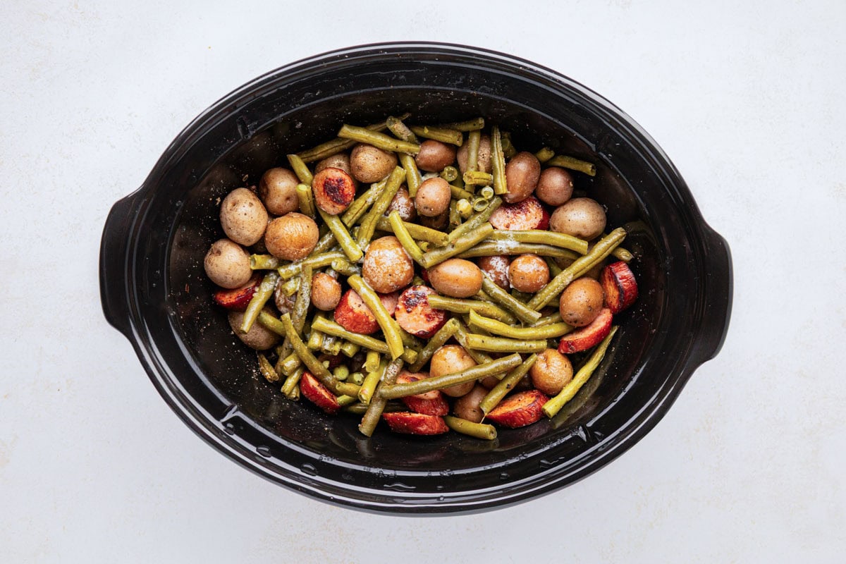 Crock pot sausage, potatoes and green beans after cooking in the slow cooker.