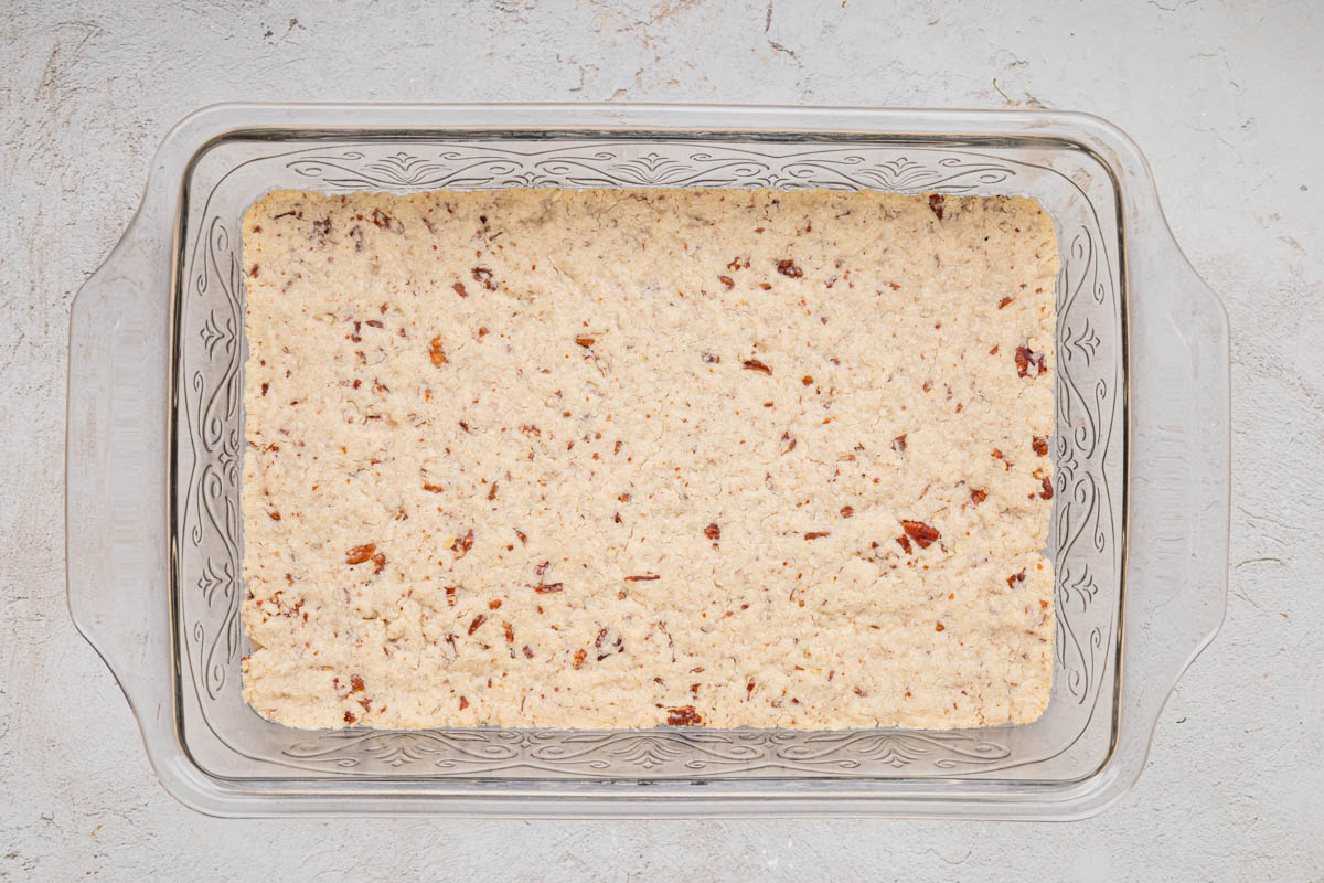 Flour and butter crust in the bottom of a baking dish after being baked.