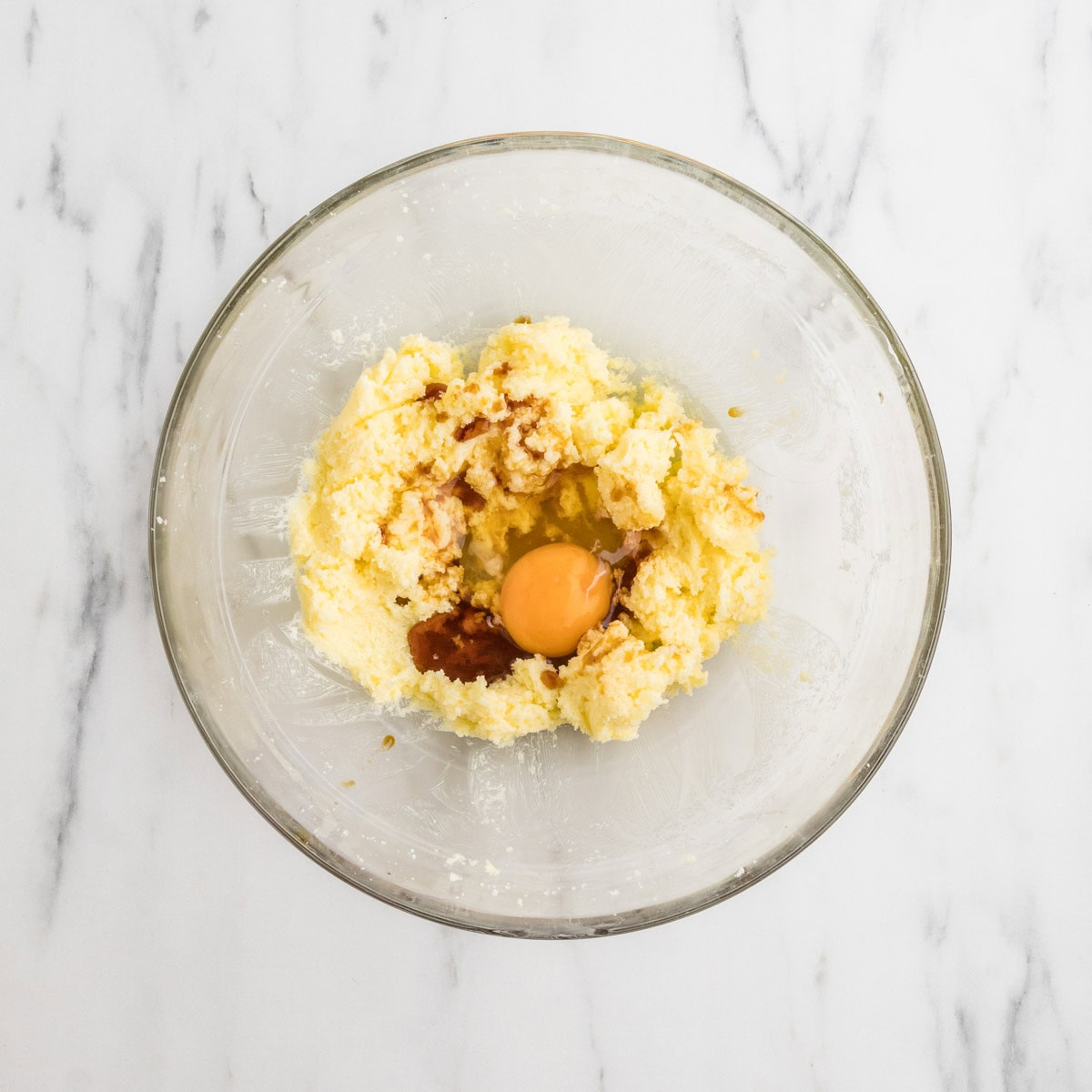 Eggs and vanilla added to the butter and sugar mixture.