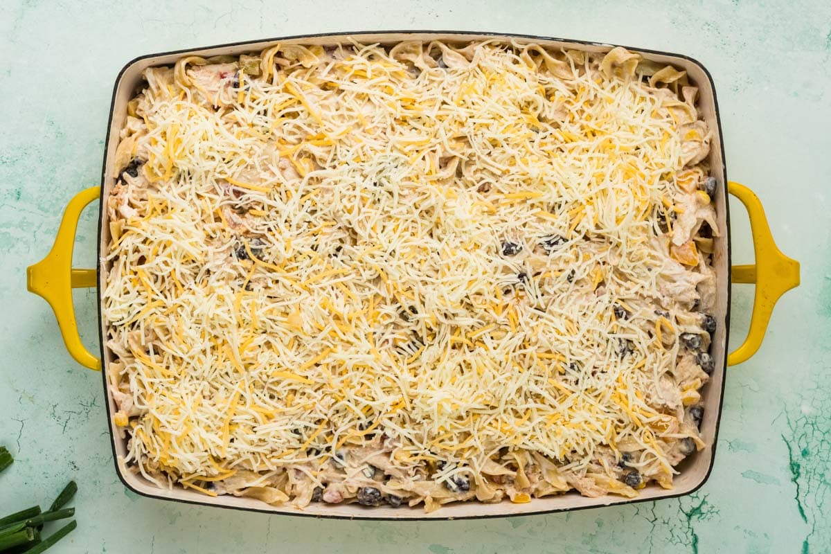 Shredded cheese added on top of the chicken noodle casserole.