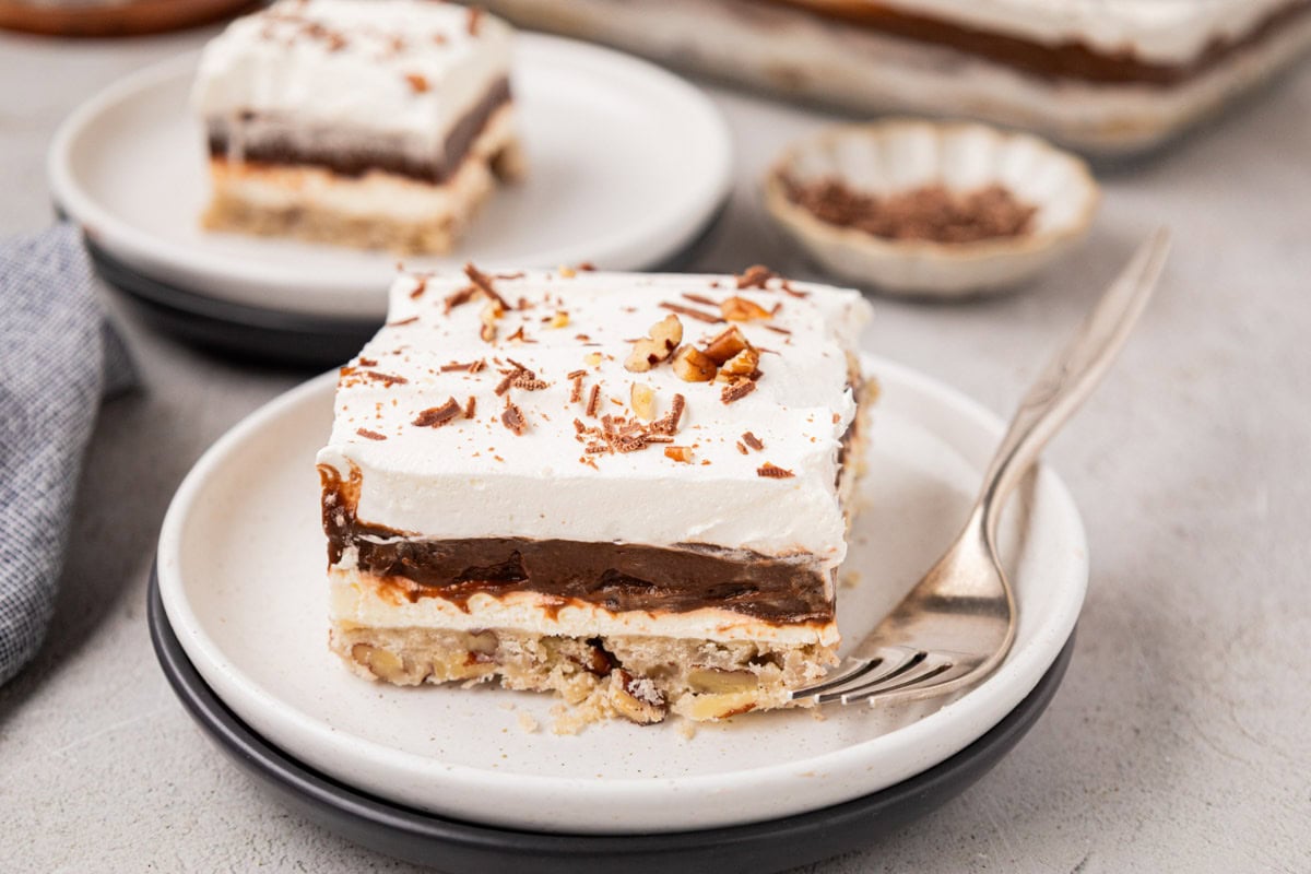 A slice of chocolate delight dessert on a plate.