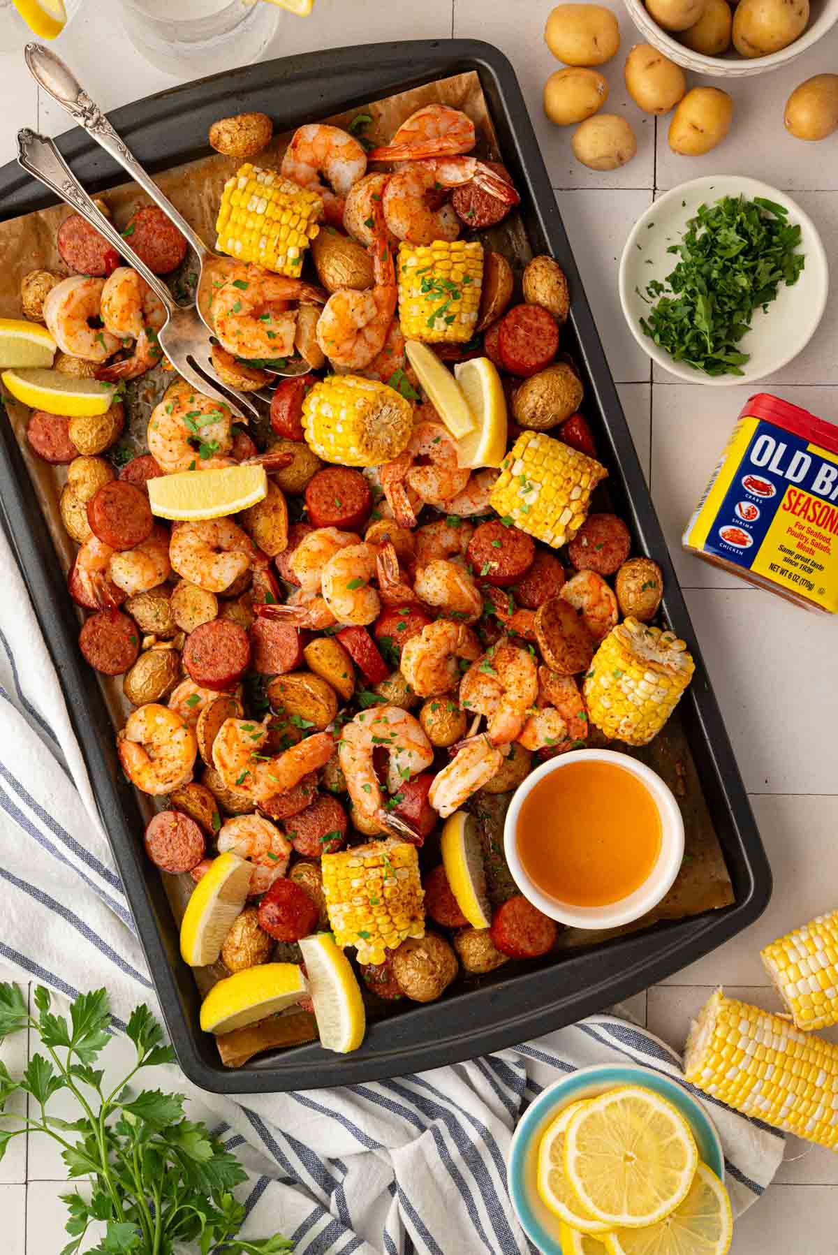 A shrimp boil made in a sheet pan.