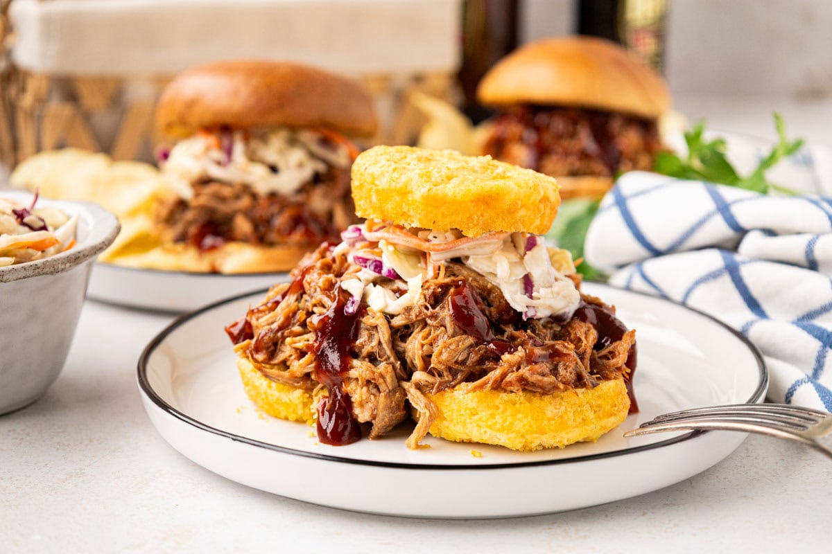 Root beer pulled pork served on corn bread muffins with slaw.