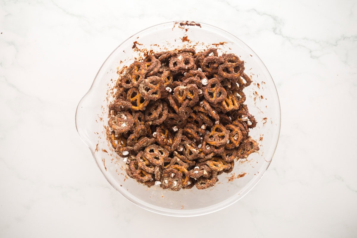 S'mores pretzel mix all together in a mixing bowl.