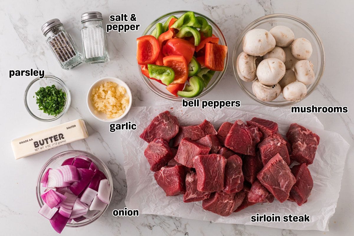 A labeled image of ingredients needed to make steak kabobs with garlic butter marinade.