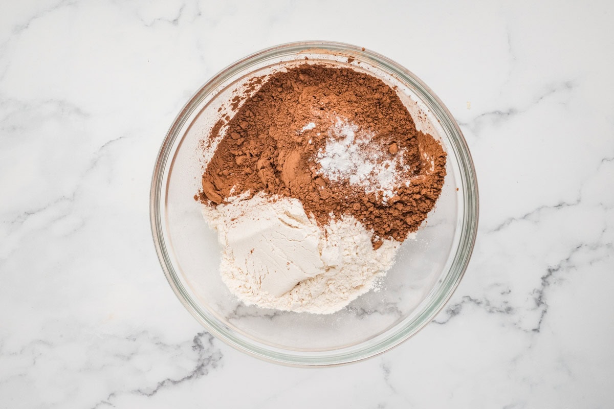 Dry ingredients for pecan pie brownies in a bowl.