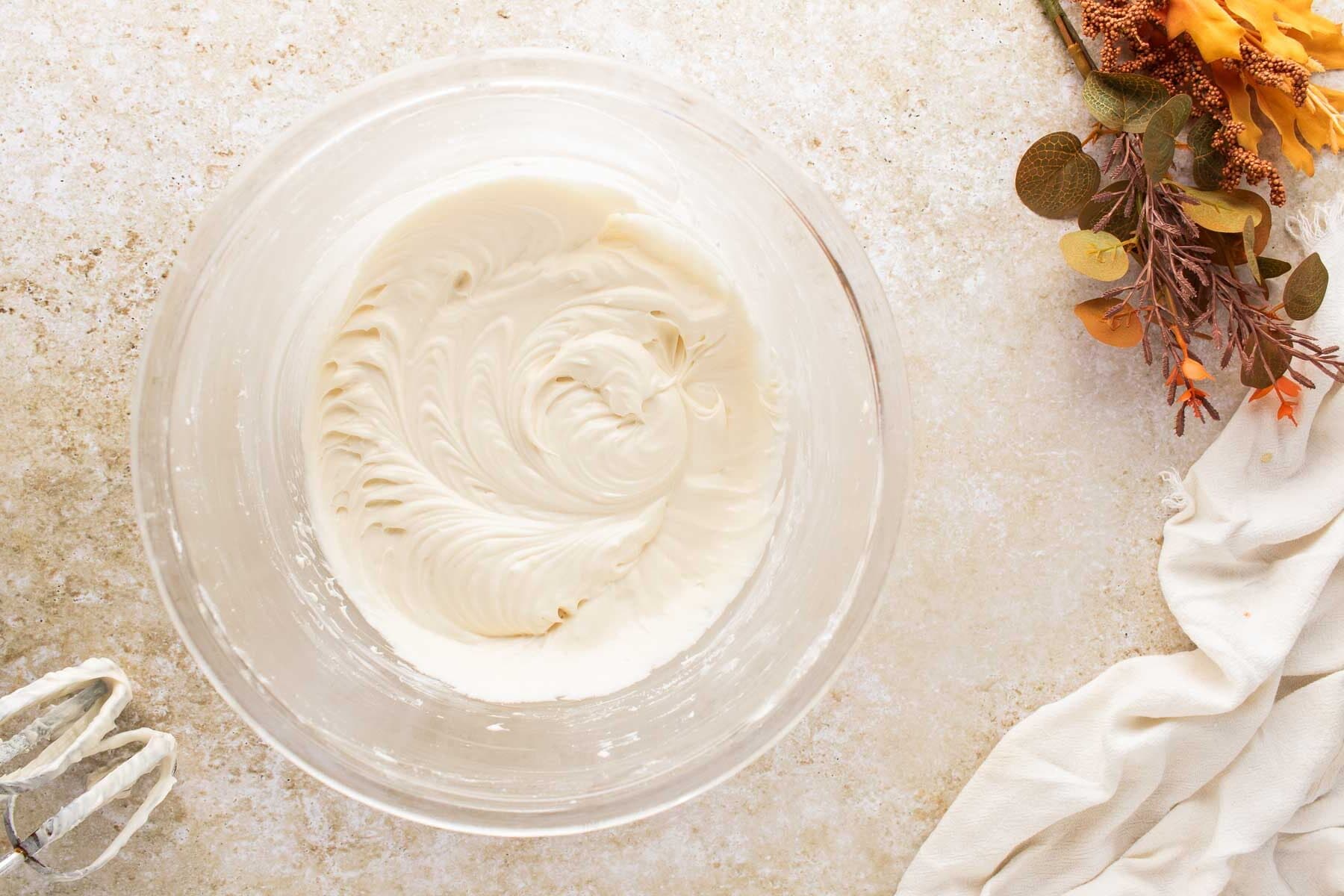 Cream cheese frosting after being mixed together.