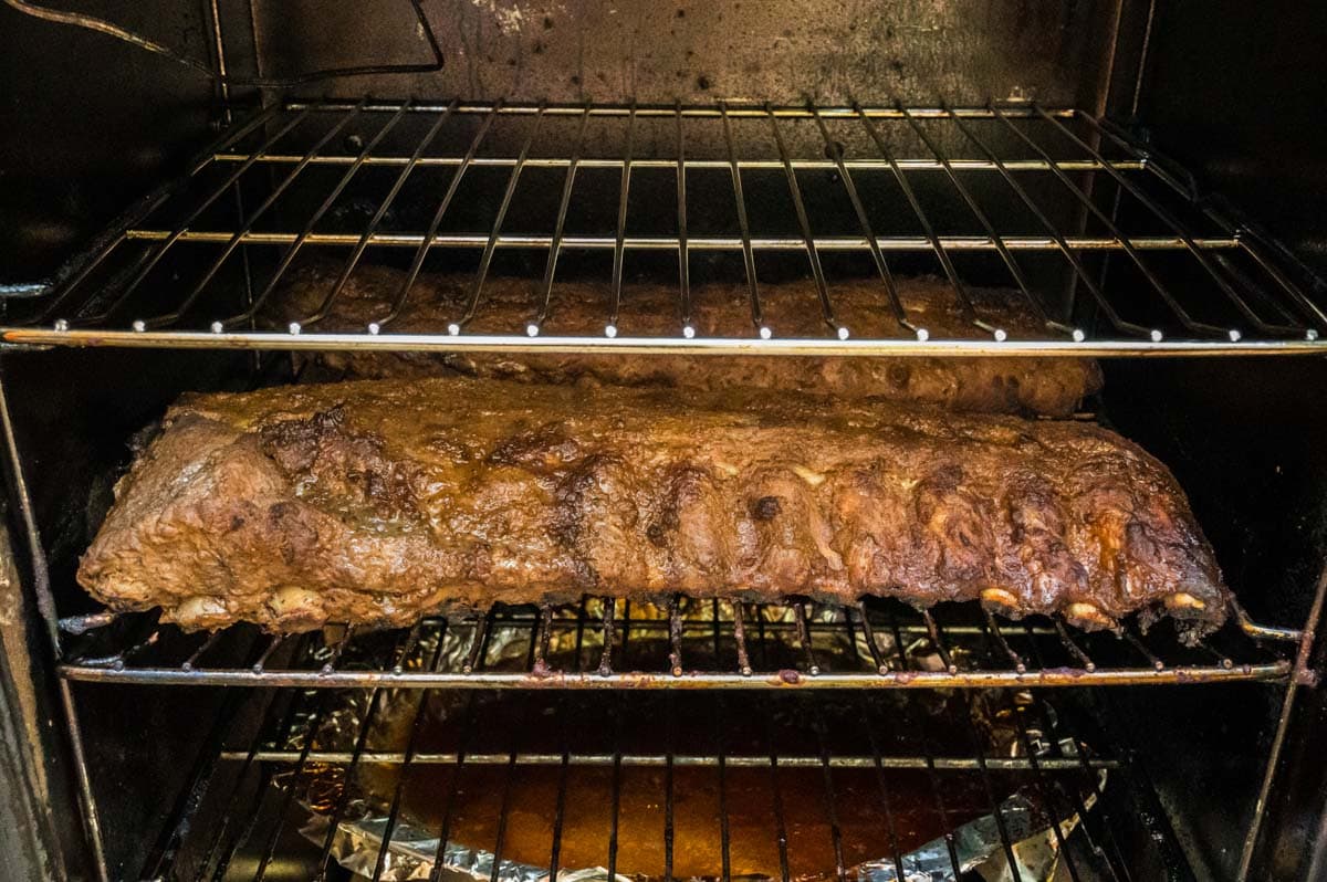 Ribs in the smoker after cooking for the first 3 hour smoke.